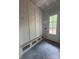 Mudroom with custom built-in cabinets, bench, and cubbies, offering practical storage and style by the door at 3030 Brookridge Ln, Charlotte, NC 28211
