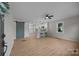 Open-concept living room view towards kitchen, featuring modern flooring and natural light at 322 Corriher Heights Ave, China Grove, NC 28023