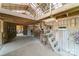 Barn interior with wooden beams, high ceilings, and open stalls offering rustic charm at 3400 Baucom Manor Rd, Monroe, NC 28110