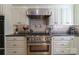 Well-equipped kitchen with stainless steel appliances, custom backsplash, and ample counter space at 3400 Baucom Manor Rd, Monroe, NC 28110