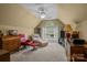 Spacious bonus room with recessed lighting and seating and large window, perfect for relaxation and entertainment at 4563 Osprey Run Ct, Denver, NC 28037