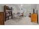 Versatile bonus room with natural light, built-in shelves, offering flexible space for a home office or entertainment area at 4563 Osprey Run Ct, Denver, NC 28037