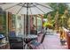 Inviting outdoor deck with comfortable seating, perfect for entertaining or relaxing in the serene surroundings at 4563 Osprey Run Ct, Denver, NC 28037