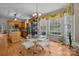 Kitchen with breakfast nook, wood cabinets, and stainless steel appliances at 4563 Osprey Run Ct, Denver, NC 28037