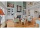 Spacious living room with built-in shelving, a fireplace, and comfortable seating at 4563 Osprey Run Ct, Denver, NC 28037