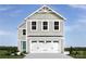 Inviting two-story home featuring neutral siding, a two-car garage, and a charming covered entryway at 5224 Mccallum Meadows Dr, Charlotte, NC 28216