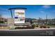 Sign for Riverbend Village shopping center with retail stores and restaurants, showcasing community amenities at 5224 Mccallum Meadows Dr, Charlotte, NC 28216