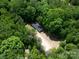 Aerial view of house and surrounding trees at 5376 Walter Estate Ln, Iron Station, NC 28080