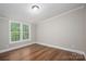 Bright bedroom features natural light and neutral wall color at 5376 Walter Estate Ln, Iron Station, NC 28080