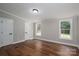 Bedroom with two windows for natural light and hardwood flooring at 5376 Walter Estate Ln, Iron Station, NC 28080