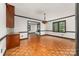 Elegant dining room featuring hardwood floors and classic built-in cabinetry, perfect for formal gatherings at 552 Blue Rock Dr, Charlotte, NC 28213