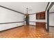 Elegant dining room featuring hardwood floors and classic built-in cabinetry, perfect for formal gatherings at 552 Blue Rock Dr, Charlotte, NC 28213