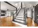 Elegant foyer with beautiful staircase and views into the living areas, showcasing the home's open layout at 552 Blue Rock Dr, Charlotte, NC 28213