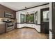A kitchen area featuring stainless steel appliances and a breakfast nook at 552 Blue Rock Dr, Charlotte, NC 28213