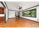 Spacious living room featuring hardwood floors and large windows, creating a bright and airy atmosphere at 552 Blue Rock Dr, Charlotte, NC 28213