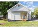 Rear exterior of the home showcasing its modern design and well-maintained backyard at 555 Pryor St, Chester, SC 29706