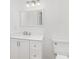 Bright white bathroom featuring a vanity, drawers, modern mirror, sink and toilet at 555 Pryor St, Chester, SC 29706