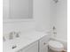 Bright bathroom featuring a vanity, drawers, mirror, sink and toilet with shower and tub at 555 Pryor St, Chester, SC 29706
