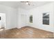 Bright bedroom with natural light, closet space, and wood-style flooring, offering a serene and inviting atmosphere at 555 Pryor St, Chester, SC 29706