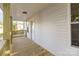Inviting front porch featuring wood flooring, light walls, and a view of the entry door and surrounding neighborhood at 555 Pryor St, Chester, SC 29706