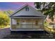 Charming home with a covered front porch and stairs at 555 Pryor St, Chester, SC 29706