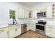 Well-equipped kitchen with stainless steel appliances, ample cabinet space, and stylish hardware accents at 555 Pryor St, Chester, SC 29706