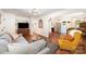Hardwood floors flow through the living room, seamlessly connecting to the kitchen and dining areas at 604 Chaney Rd, Monroe, NC 28110