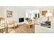 Cozy living room with a decorative fireplace, neutral furniture, and lots of light at 611 Heathermoor Ct, Charlotte, NC 28209