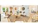 Inviting living room with modern decor, a stylish area rug, and a view of the dining area at 611 Heathermoor Ct, Charlotte, NC 28209