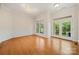 Dining room with hardwood floors, wainscotting and large windows at 6218 Indian Trail Fairview Rd, Indian Trail, NC 28079
