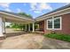 Charming home with a covered carport area, a well-maintained exterior, and a neatly landscaped yard at 6218 Indian Trail Fairview Rd, Indian Trail, NC 28079