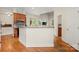 Modern kitchen with an island, stainless steel appliances, and an open floor plan at 6218 Indian Trail Fairview Rd, Indian Trail, NC 28079
