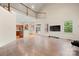 An open floorplan living room with staircase and entry to kitchen at 6218 Indian Trail Fairview Rd, Indian Trail, NC 28079