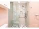 Updated bathroom featuring a glass enclosed shower with a rainfall shower head and subway tile at 625 2Nd Ne St, Hickory, NC 28601