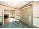 Foyer with marble-look tile, chandelier, and French doors leading to living areas at 625 2Nd Ne St, Hickory, NC 28601