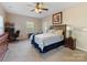 Comfortable bedroom with a desk and windows providing lots of natural light at 7325 Forrest Rader Dr, Mint Hill, NC 28227
