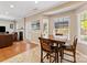 Charming breakfast nook with natural light, views into living area, and room for seating at 7325 Forrest Rader Dr, Mint Hill, NC 28227