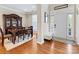 Formal dining room with hardwood floors, elegant hutch, and natural light creating an inviting atmosphere at 7325 Forrest Rader Dr, Mint Hill, NC 28227