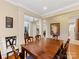 Spacious dining room featuring hardwood floors and easy access to other areas of the home at 7325 Forrest Rader Dr, Mint Hill, NC 28227