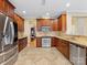 Well-equipped kitchen features stainless steel appliances, abundant cabinets, and easy access to additional rooms at 7325 Forrest Rader Dr, Mint Hill, NC 28227