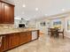 Bright and spacious kitchen with granite countertops, tile floors, and stainless steel appliances at 7325 Forrest Rader Dr, Mint Hill, NC 28227