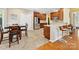 Modern kitchen with stainless steel appliances, granite countertops, and a breakfast bar at 7325 Forrest Rader Dr, Mint Hill, NC 28227