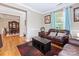 Comfortable living room features hardwood floors, natural light, and modern furnishings at 7325 Forrest Rader Dr, Mint Hill, NC 28227