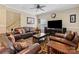 Comfortable living room with ample seating, neutral walls, and a ceiling fan at 7325 Forrest Rader Dr, Mint Hill, NC 28227