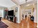 Expansive living area showcasing hardwood floors and offering an open layout to other areas of the home at 7325 Forrest Rader Dr, Mint Hill, NC 28227