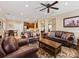 Open-concept living room offering plenty of space, natural light, and seamless flow to kitchen at 7325 Forrest Rader Dr, Mint Hill, NC 28227
