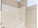 This bathroom features a shower and tub combo with brushed silver hardware at 7325 Forrest Rader Dr, Mint Hill, NC 28227