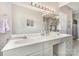 Bathroom with a double sink vanity, and large mirrors that amplify light and space at 7525 Windy Pine Cir, Denver, NC 28037