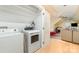 Convenient laundry room with washer and dryer hookups located on the upper level with easy access to bedrooms at 7525 Windy Pine Cir, Denver, NC 28037