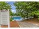 Community water access area with ramp, signage, and clear views of the lake, perfect for residents to enjoy at 7525 Windy Pine Cir, Denver, NC 28037